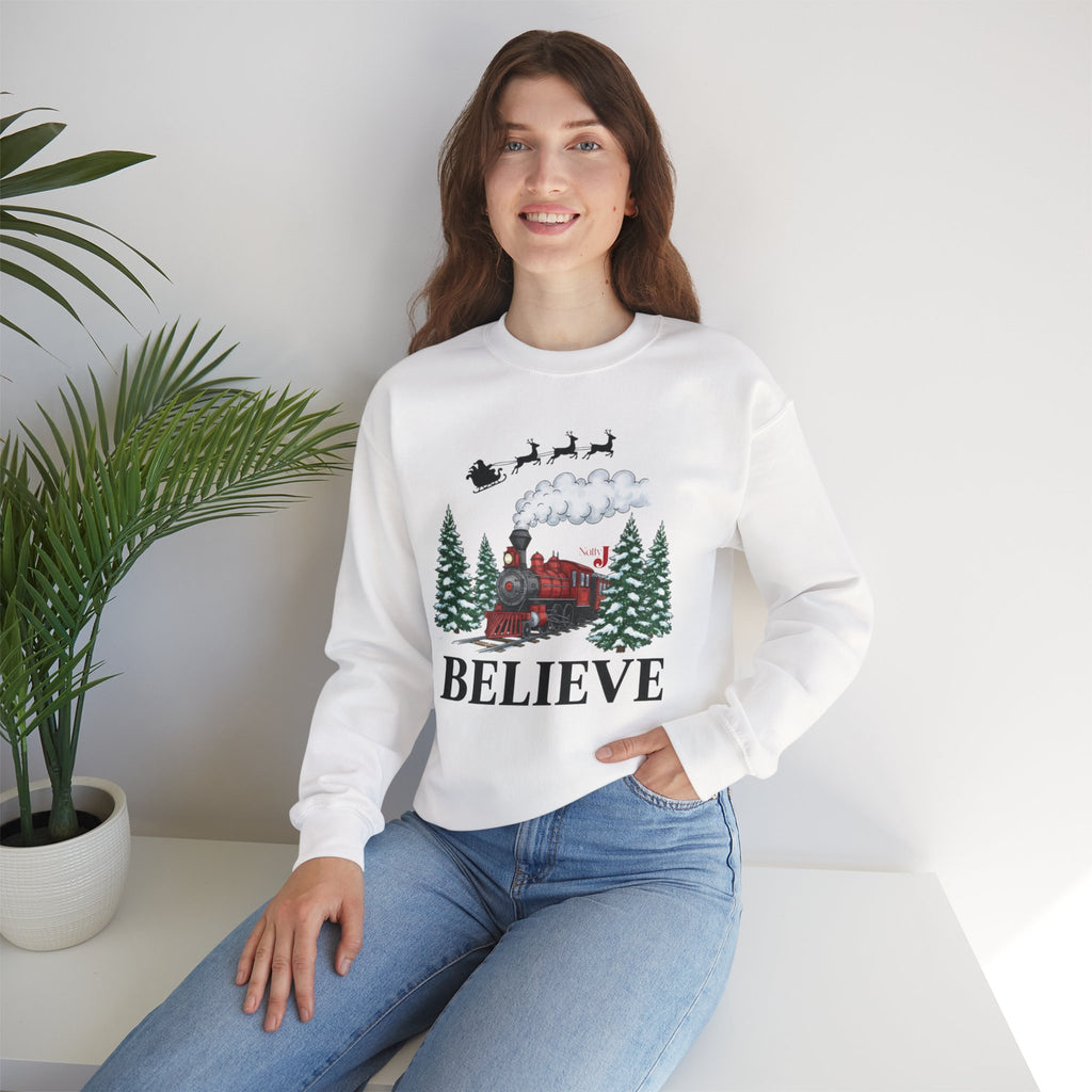 Women’s Believe Christmas Sweatshirt – Festive Holiday Train & Santa Sleigh Crewneck – Cozy Winter Graphic Sweatshirt for Women – Christmas Outfit Top