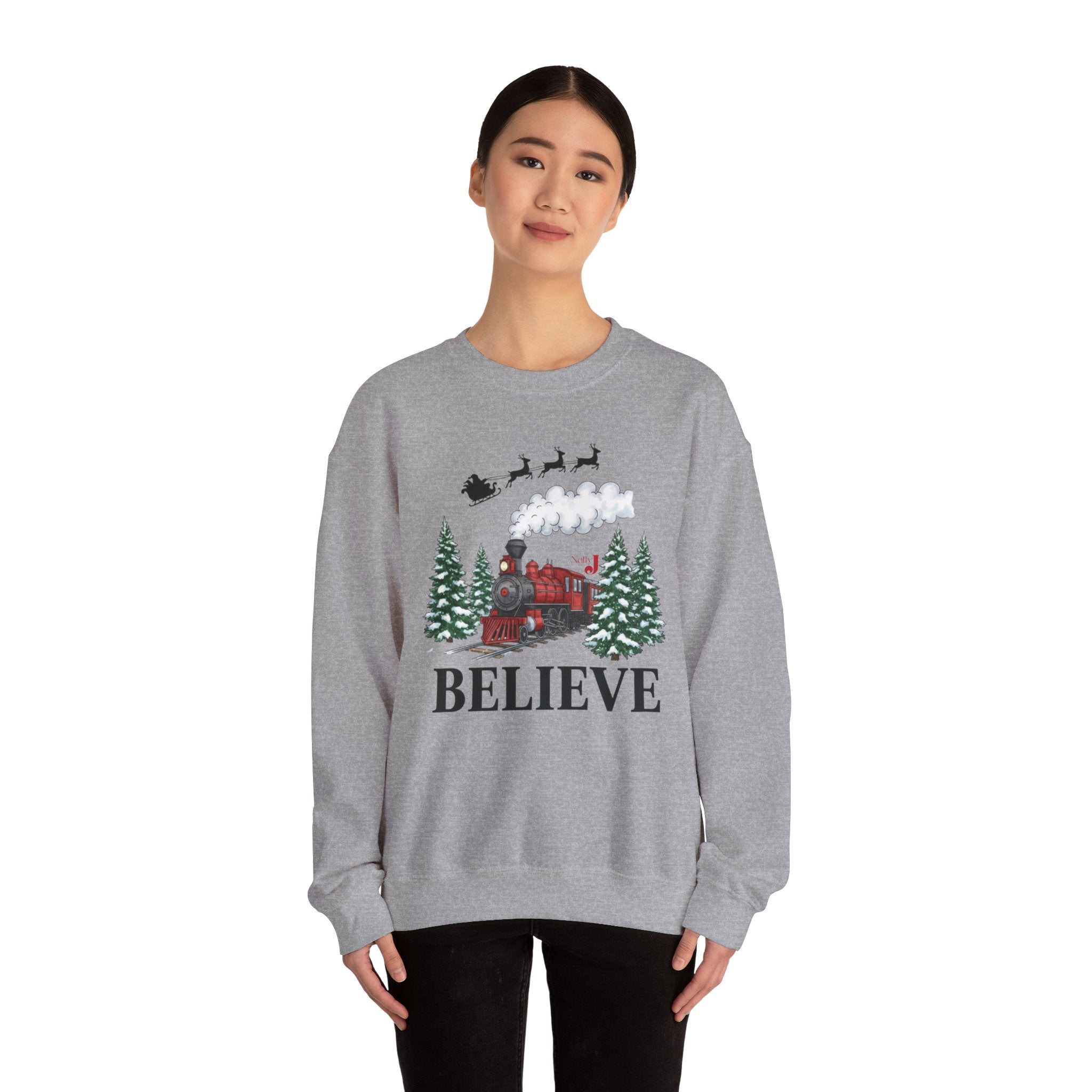 Women’s Believe Christmas Sweatshirt – Festive Holiday Train & Santa Sleigh Crewneck – Cozy Winter Graphic Sweatshirt for Women – Christmas Outfit Top