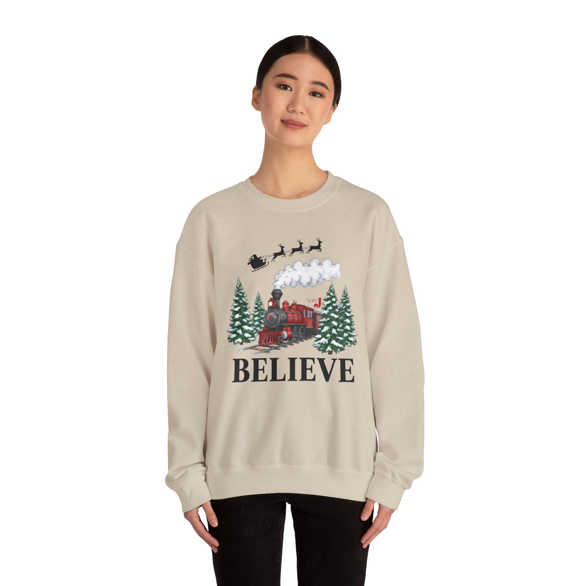 Women’s Believe Christmas Sweatshirt – Festive Holiday Train & Santa Sleigh Crewneck – Cozy Winter Graphic Sweatshirt for Women – Christmas Outfit Top