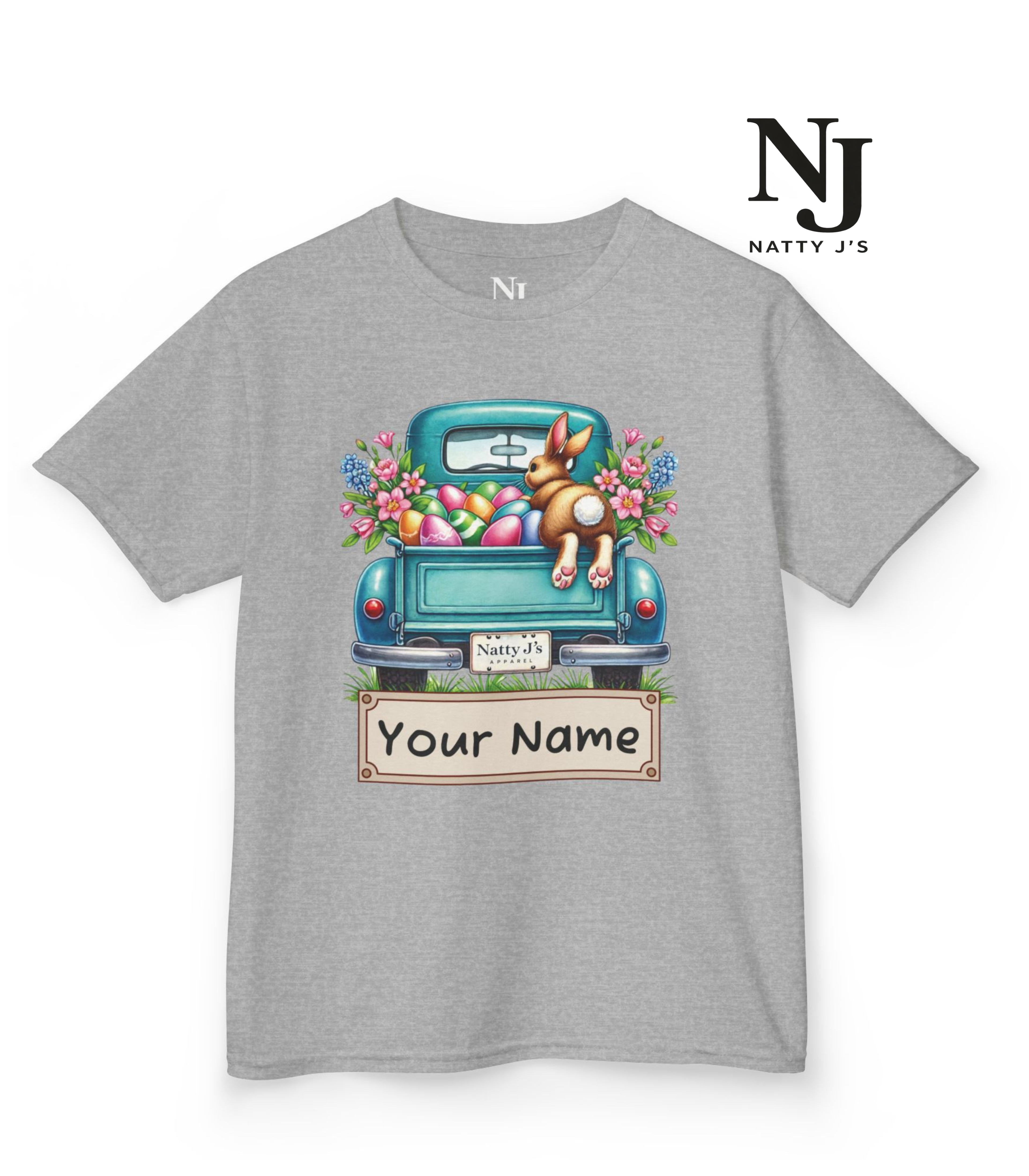 Gray t-shirt with a graphic of a rabbit in a truck and flowers, branded 'Natty J's'.
