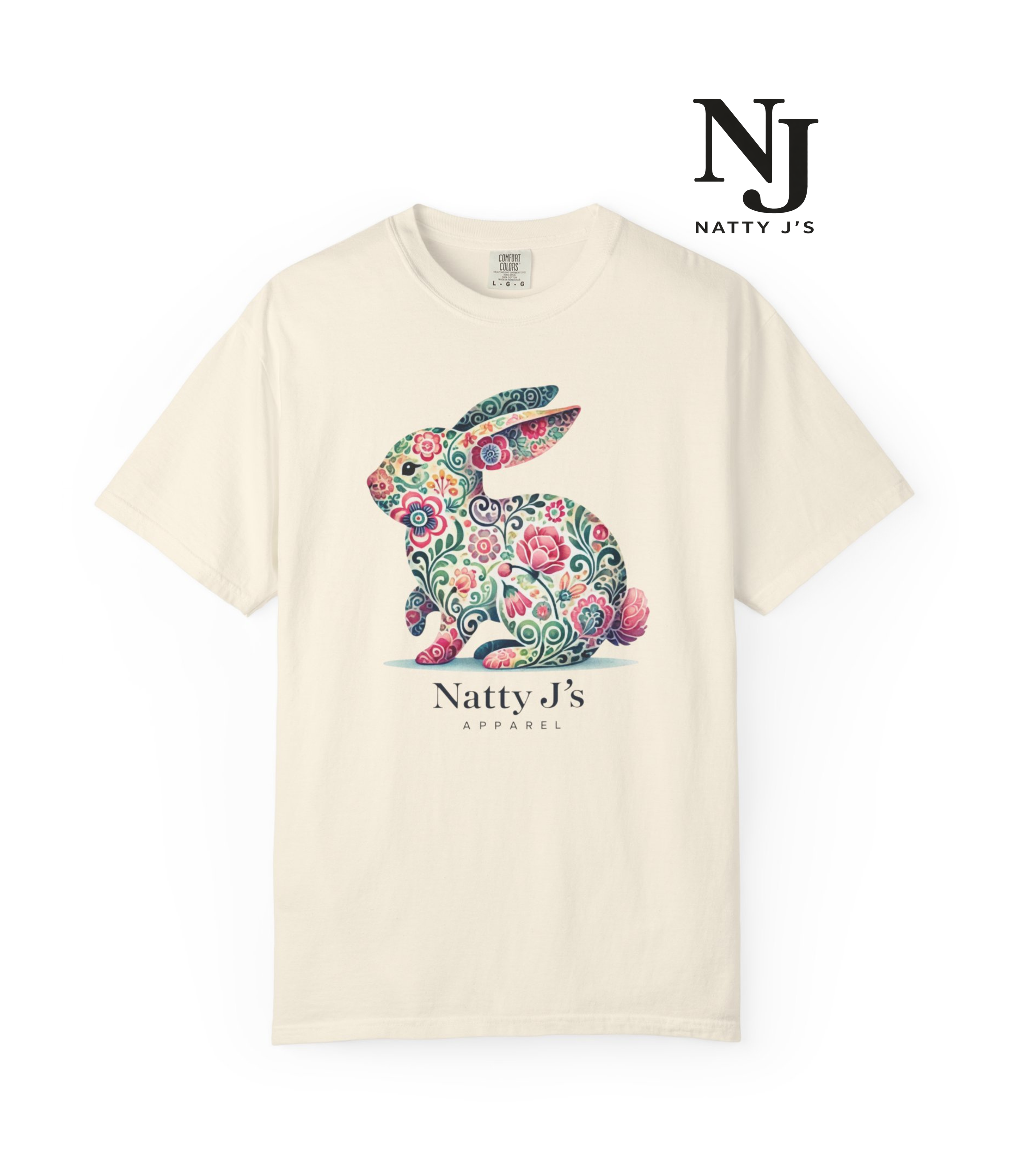 Beige t-shirt with a colorful floral rabbit design and 'Natty J's' branding on a white background.
