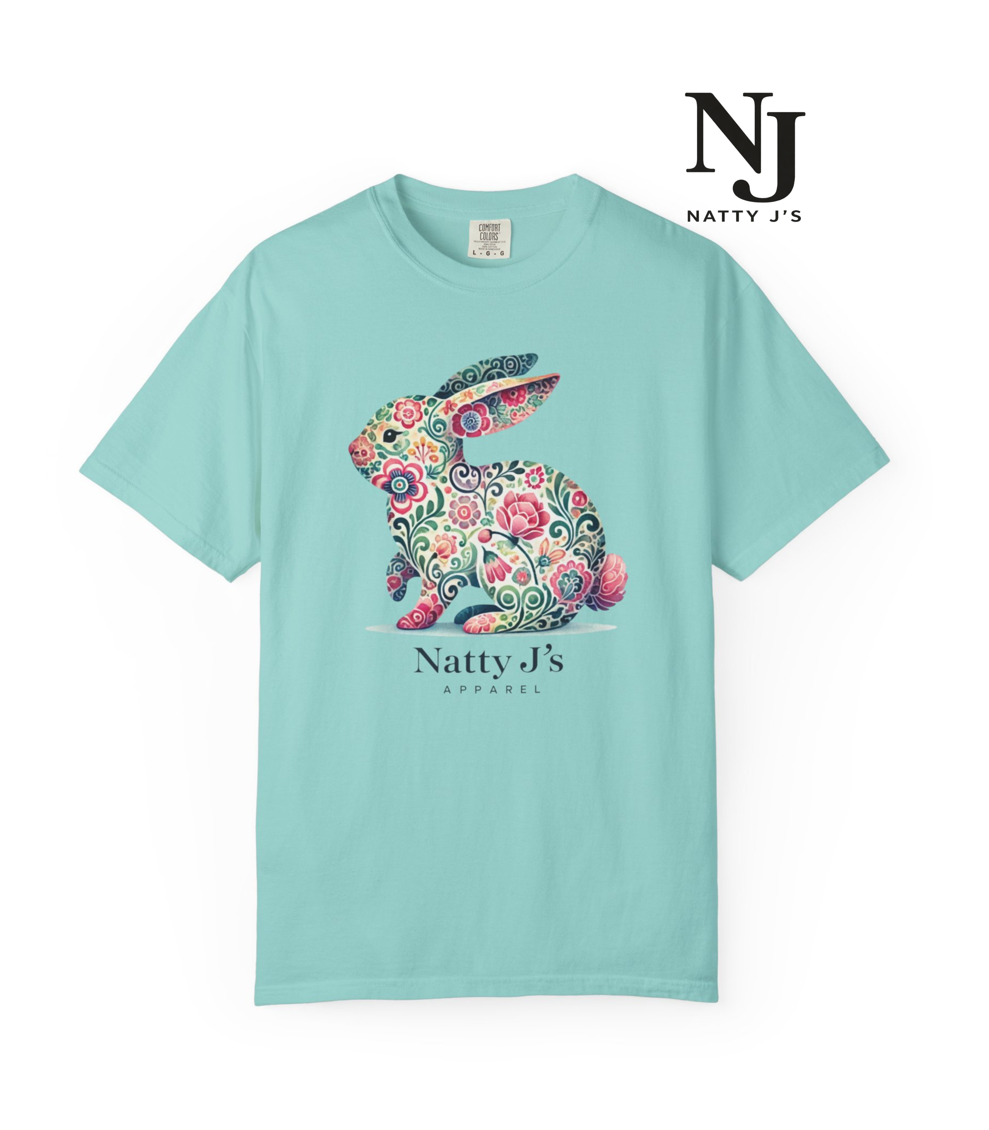 Light blue t-shirt with floral rabbit design and 'Natty J's' branding on a white background