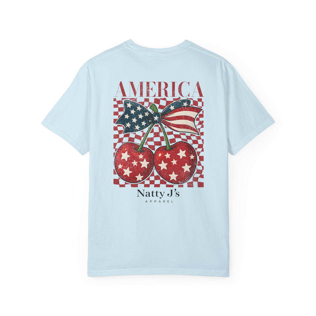 Light Blue (Chambray) women's patriotic cherry shirt with American flag bow and red white blue design on light blue t-shirt
women's 4th of July shirt with cherries and American flag graphic
America cherry youth t-shirt patriotic summer outfit for Women
red white blue cherry graphic tee for women's independence day shirt
trendy patriotic women's shirt with vintage cherry design featring NattyJ's Apparel