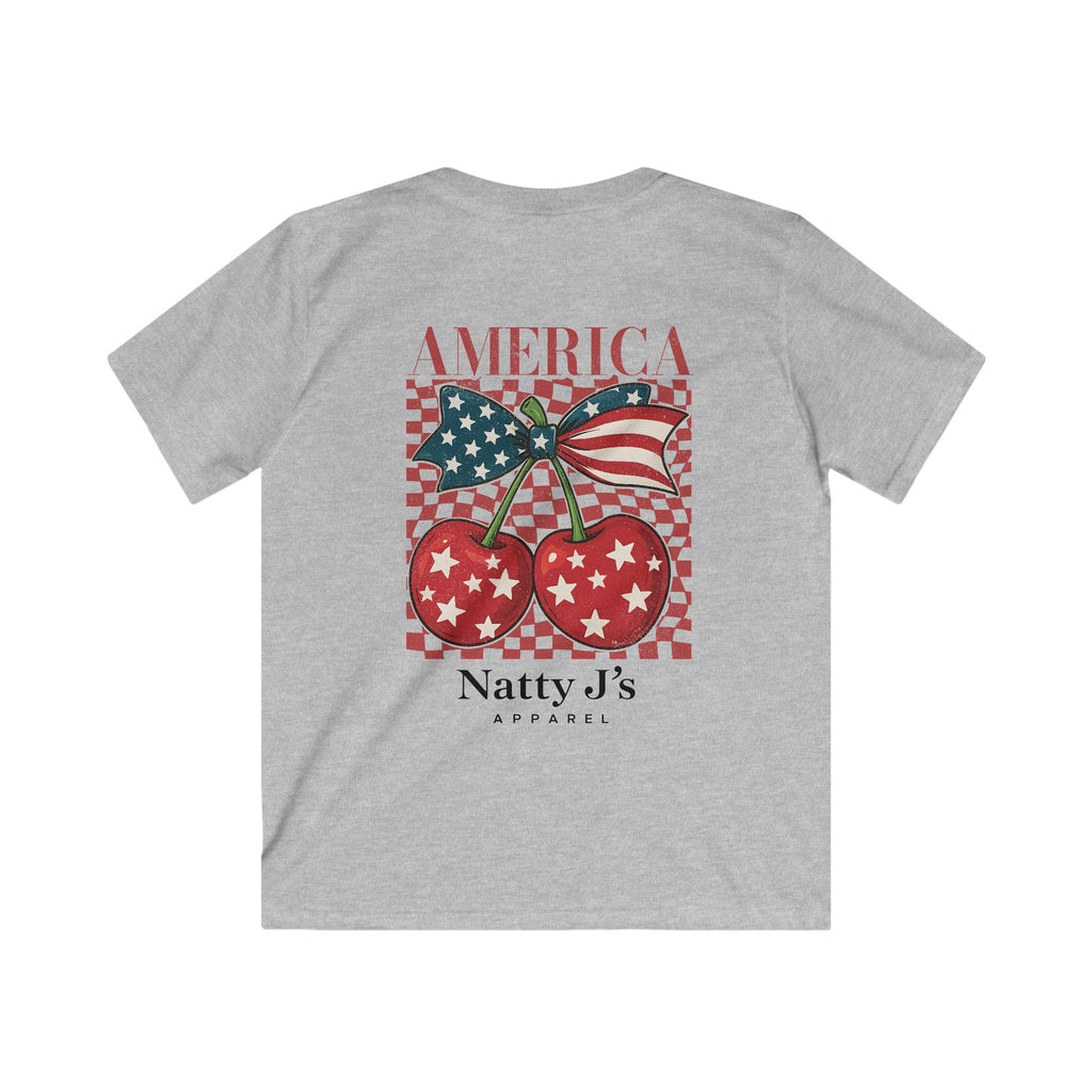 Grey youth patriotic cherry shirt with American flag bow and red white blue design on light blue t-shirt
kids 4th of July shirt with cherries and American flag graphic
America cherry youth t-shirt patriotic summer outfit for kids
red white blue cherry graphic tee for kids independence day shirt
trendy patriotic kids shirt with vintage cherry design featuring NattyJ's Apparel