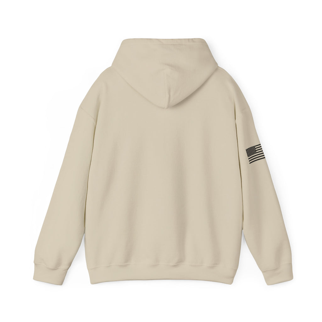 Beige hoodie with a small flag patch on the sleeve against a white background