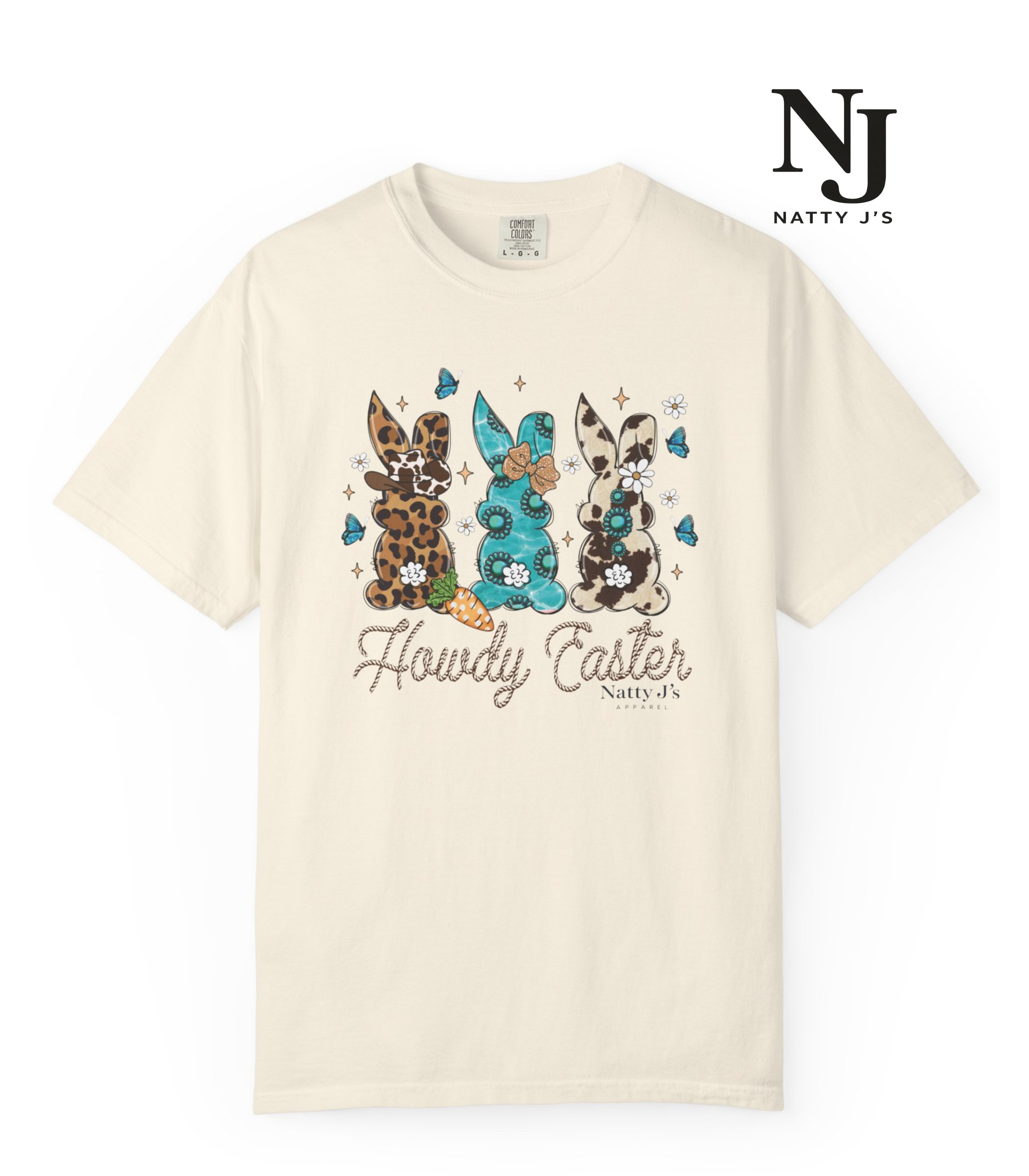 Beige t-shirt with Easter-themed design featuring rabbits and 'Natty J's' branding.