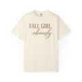 An off-white short-sleeve crewneck t-shirt with the text 'FALL GIRL, obviously' printed on the chest in a dusty rose-brown color, displayed against a solid white background.